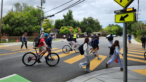kids biking on road