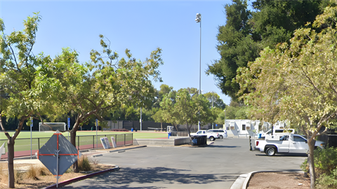 parking lot next to field