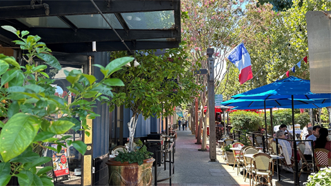 street view with flag and dining tables