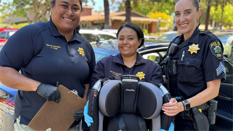 police officer with car seat