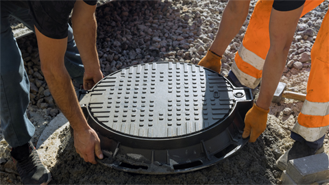 manwhole cover with people