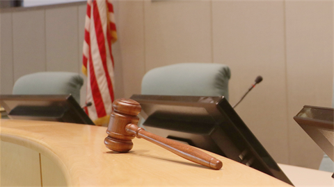 gavel on a council dais