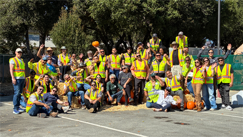 Public Works staff group photo in neon safety vests