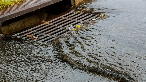 Stormwater-flows-into-storm-drain.jpg