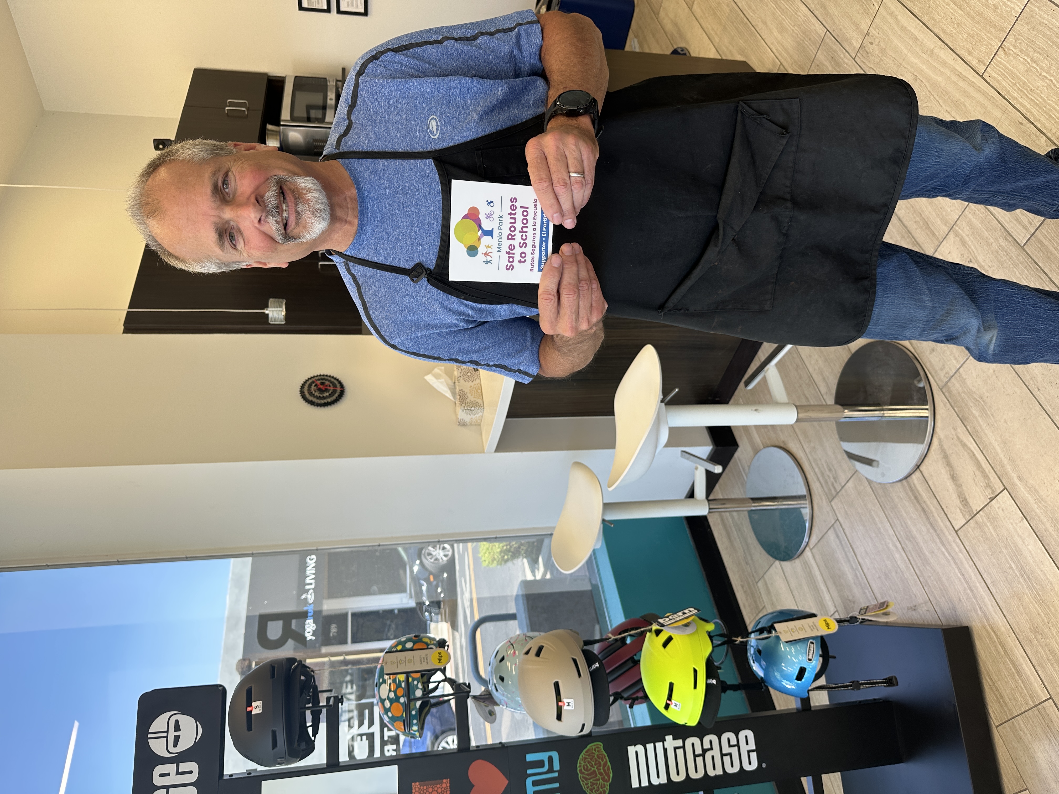 Man with safe routes to school card